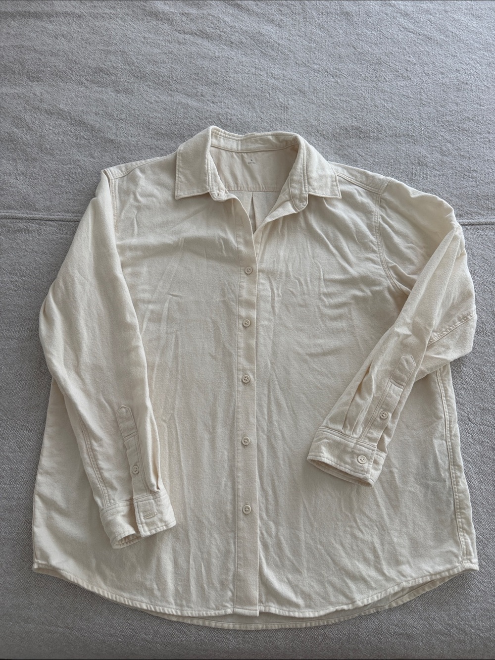 Muji Women’s cream colored flannel button down